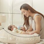 nằm gối chống trào ngược có bị gù lưng không
